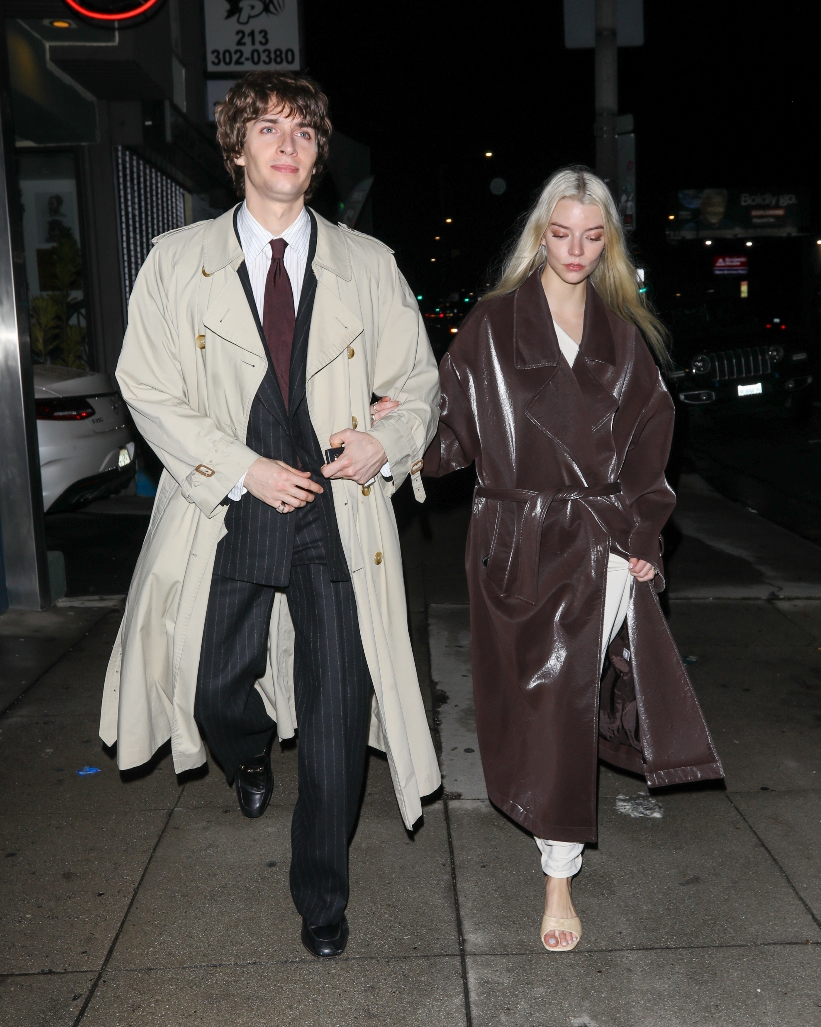 Anya Taylor-Joy styled a leather brown wrap coat inspired by Fall 2025 outerwear trends