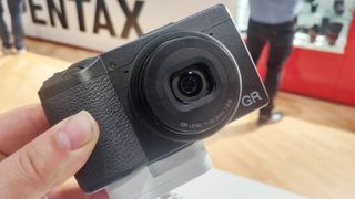 Ricoh GR III held in the hands at The Photography & Video Show