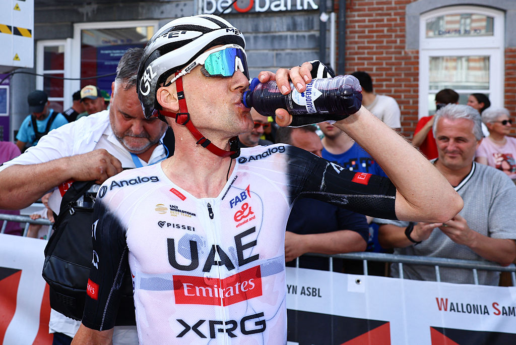 UAE Team Emirates&#039;s Belgian rider Tim Wellens takes a drink after winning the Men&#039;s Elite road race of the Belgian Cycling Championships, 230km from and to the Grand Place square in Binche, on June 29, 2025. (Photo by DAVID PINTENS / Belga / AFP) / Belgium OUT