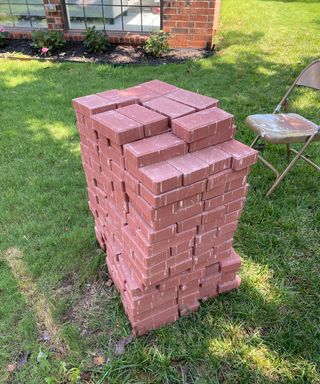 Patio bricks in a stack in garden