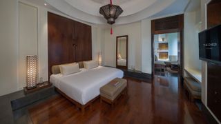 Rooms at The Chedi Muscat have minimalist, but moody styling
