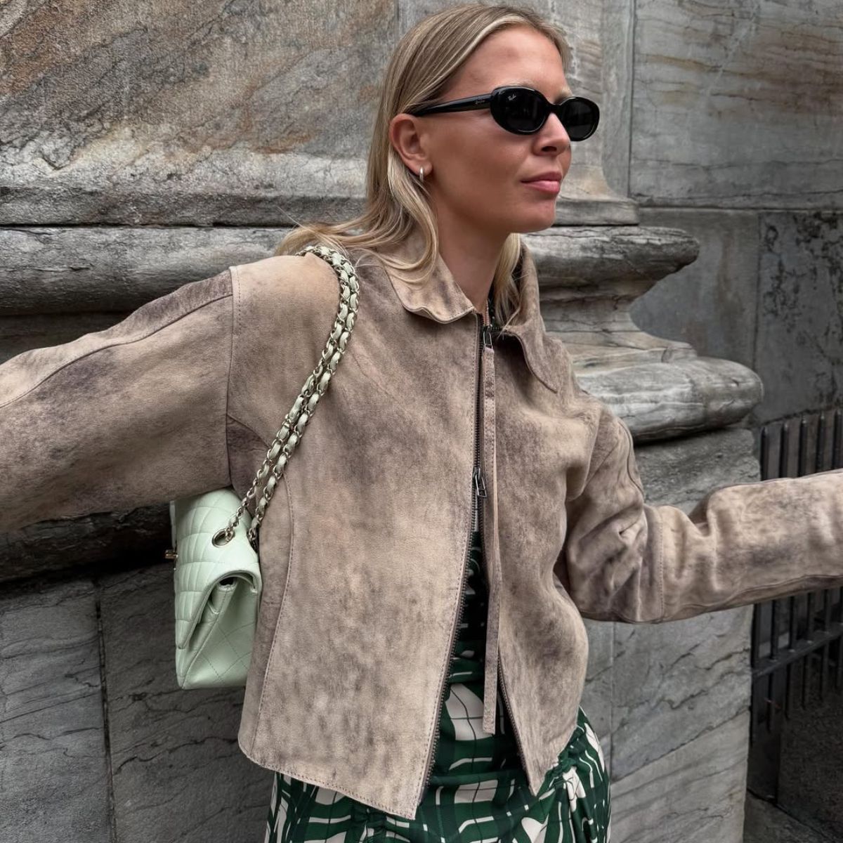 blonde woman wearing jacket