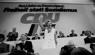 Margaret Thatcher waves at a meeting of the Christian Democratic Union in Hannover, Germany in 1976.