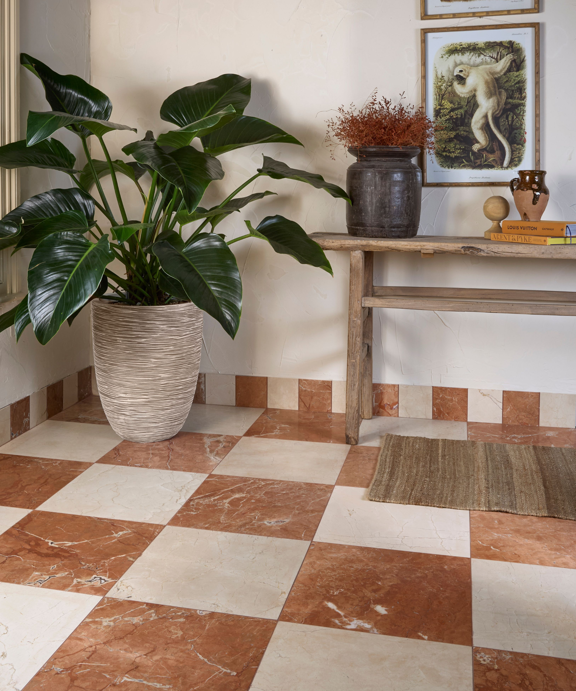 Chequered flooring carried up onto a skirting board