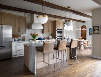 a kitchen with beams