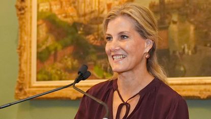 Sophie, Duchess of Edinburgh wears a burgundy blouse and wide-leg trousers as she announces the winner of the British Fashion Council&#039;s Queen Elizabeth II Award for British Design