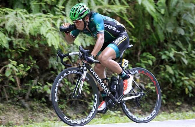 Arashiro (Europcar) grabs a drink on stage 6 of the Tour de Langkawi
