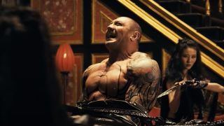 Dave Bautista struggling to get free in The Man With the Iron Fists