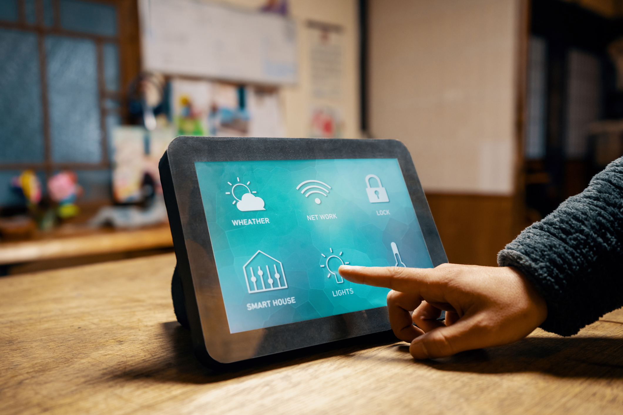 Hand turning lights off or on with a smart device