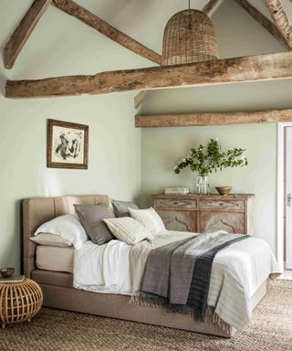 Green bedroom, wooden beams