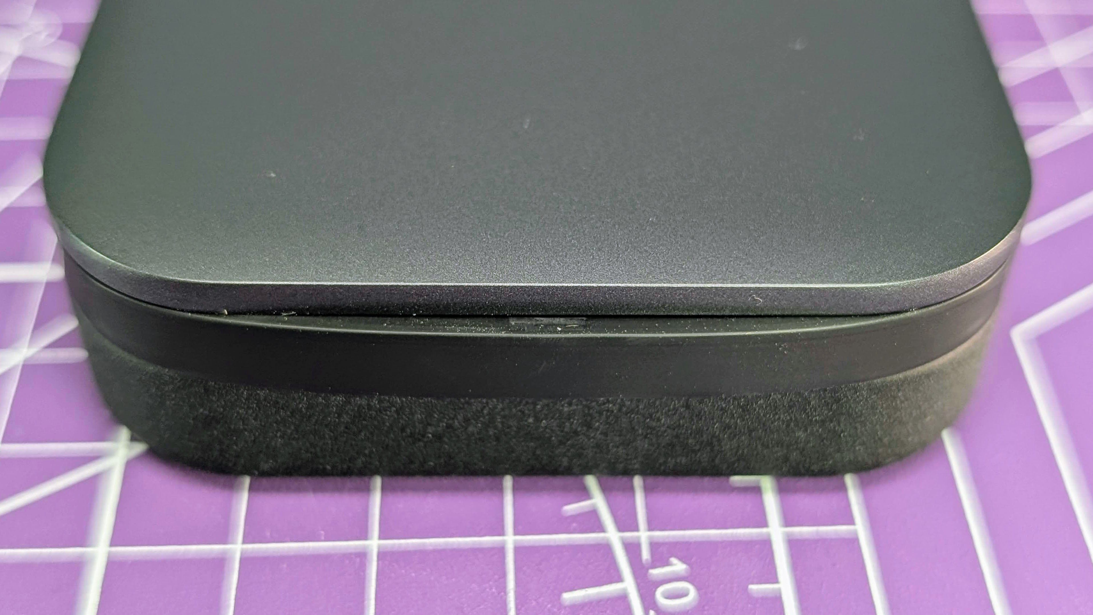 Lenovo Go USB-C laptop power bank showing that the USB-C cable does not slide cleanly back into place.