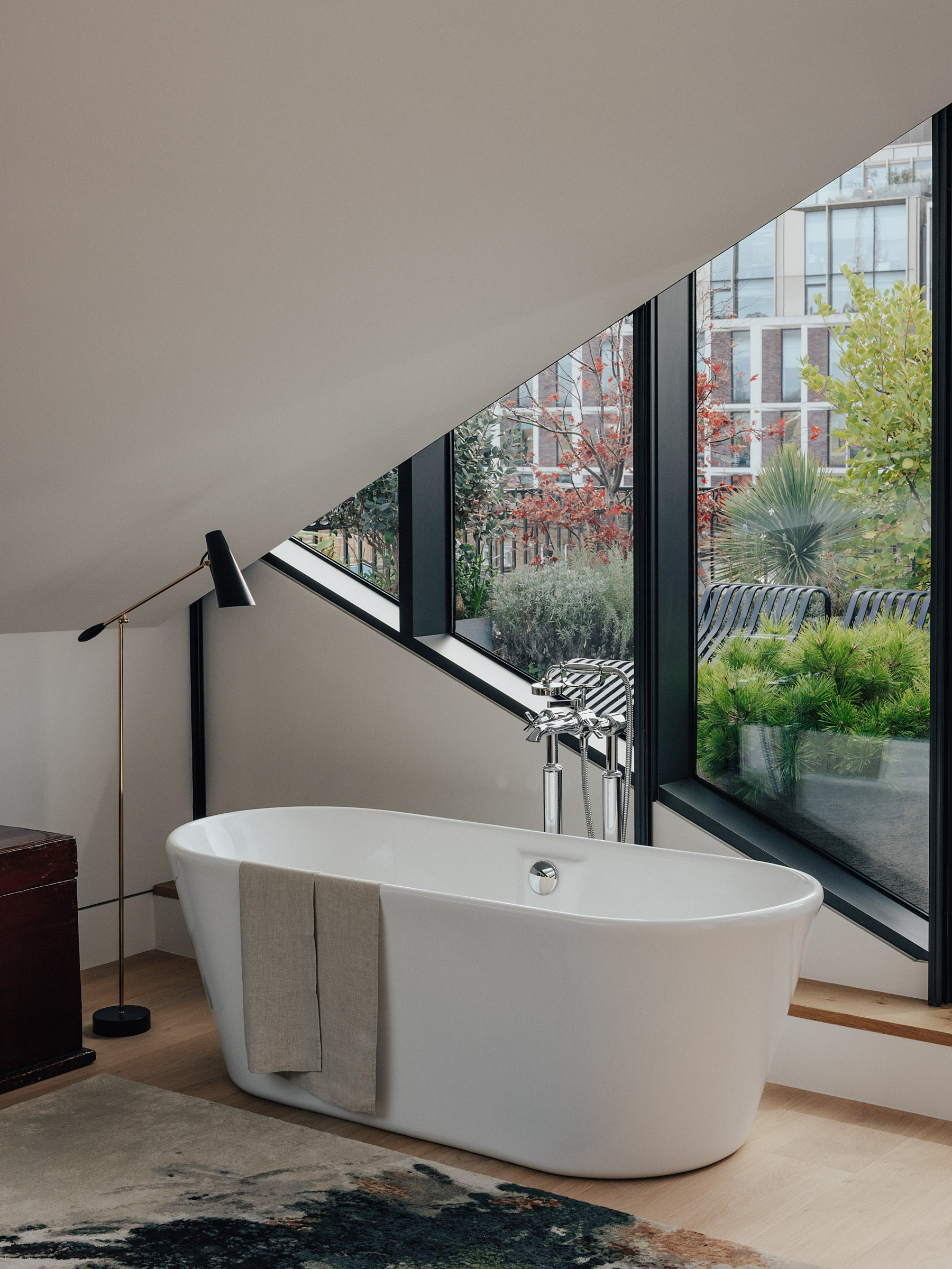 The freestanding bath overlooks the private fifth floor terrace