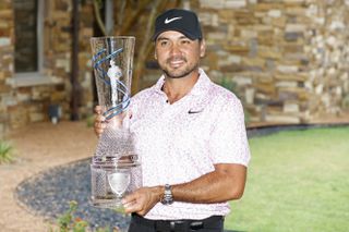 Jason Day holds the AT&T Byron Nelson trophy