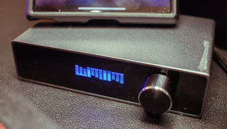 The Wimlim i510B DAC accepts Bluetooth and USB thumb drive inputs.