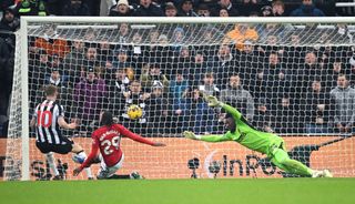 Manchester United goalkeeper Andre Onana and defender Aaron Wan-Bissaka are beaten by Newcastle United player Anthony Gordon for the winning goal during the Premier League match between Newcastle United and Manchester United at St. James Park on December 02, 2023 in Newcastle upon Tyne, England. (Photo by Stu Forster/Getty Images)