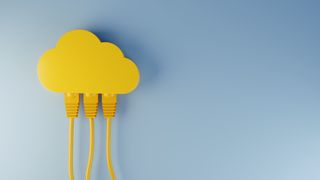A yellow 3D-printed cloud with ethernet cables connected