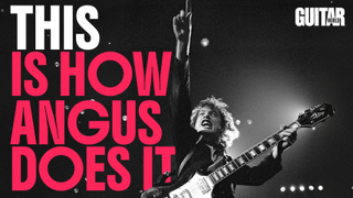 Angus Young of AC/DC pointing