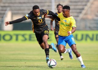 Themba Zwane challenged by Njabulo Blom