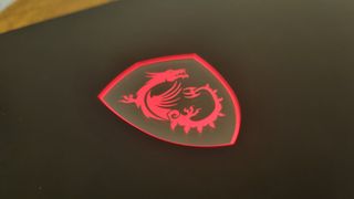 The light-up MSI logo on the lid of the Titan 18 HX.