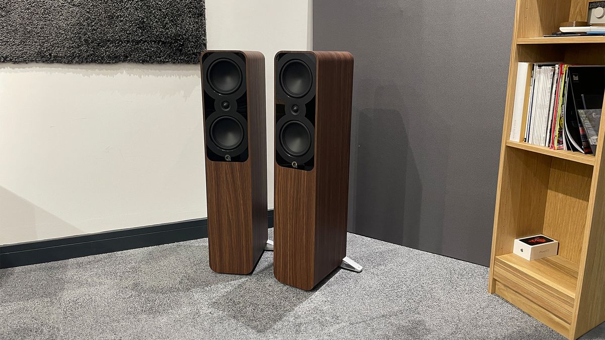 Q Acoustics 5050 floorstanding speakers in test room next to bookshelf