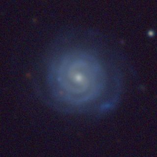 An image of one of the Milky Way-like galaxies found by astronomers Timothy Licquia and Jeffrey Newman. This galaxy, known as SDSS J083909.27+450747.7, has properties which closely match those of the galaxy we live in and may be as close as astronomers can get to a view of the Milky Way as seen from outside.