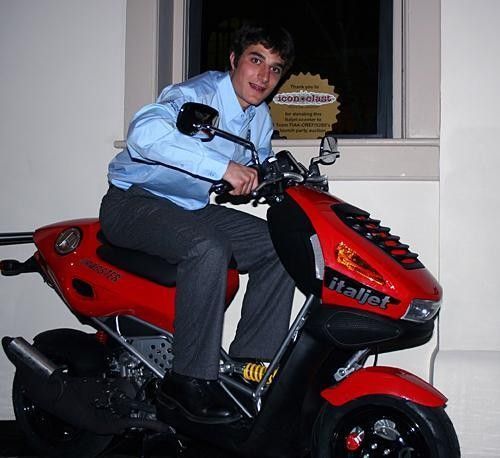 Ryan Luttrell trying to escape on the Italtjet scooter that was up for auction.