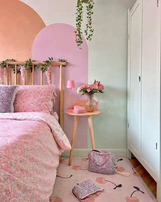 Pastel bedroom with pink and green accents