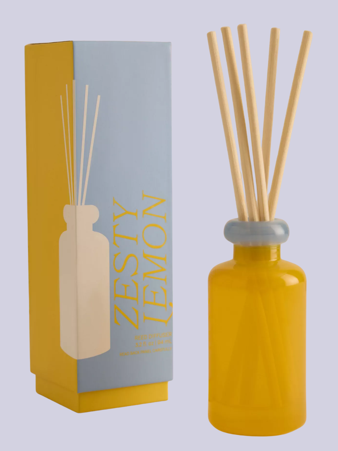 A yellow and blue glass diffuser with wood reeds from Paddywax