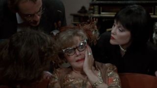 Mrs. Peacock looking distressed in Clue