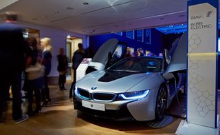 Main sponsor BMW managed to squeeze its eye-catchingly curvy electric sports car, the i8, through the door...