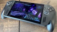 An Asus ROG Xbox Ally X on a wooden desk playing Halo: Campaign Evolved