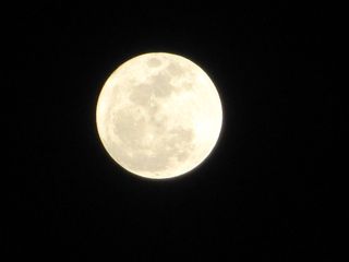 In Amman, Jordan, skywatcher Ahlam Zayed snapped this photo of the March 19 full moon, the so-called "supermoon" of 2011.
