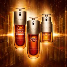 Clarins Double Serum, Double Serum Eye and Double Serum Light Texture on a graphic light background