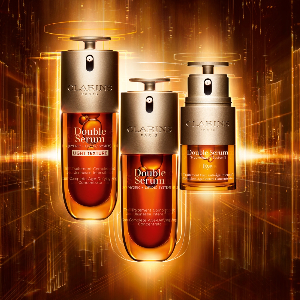 Clarins Double Serum, Double Serum Eye and Double Serum Light Texture on a graphic light background