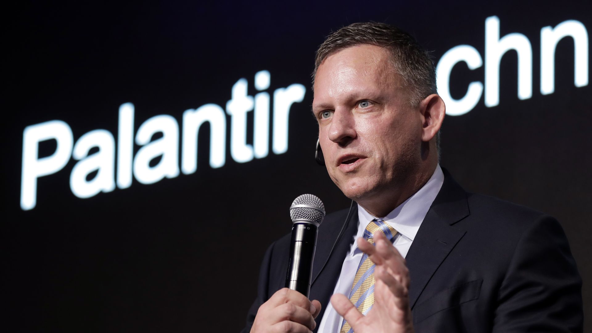 Peter Thiel, co-founder and chairman of Palantir Technologies Inc., speaks during a news conference in Tokyo, Japan, on Monday, Nov. 18, 2019.