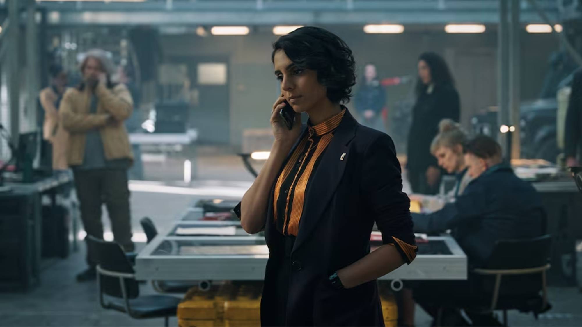 Anjli Mohindra as Archie in "The Lazarus Project"