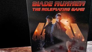 Blade Runner RPG Starter Set box on a wooden surface against a black background