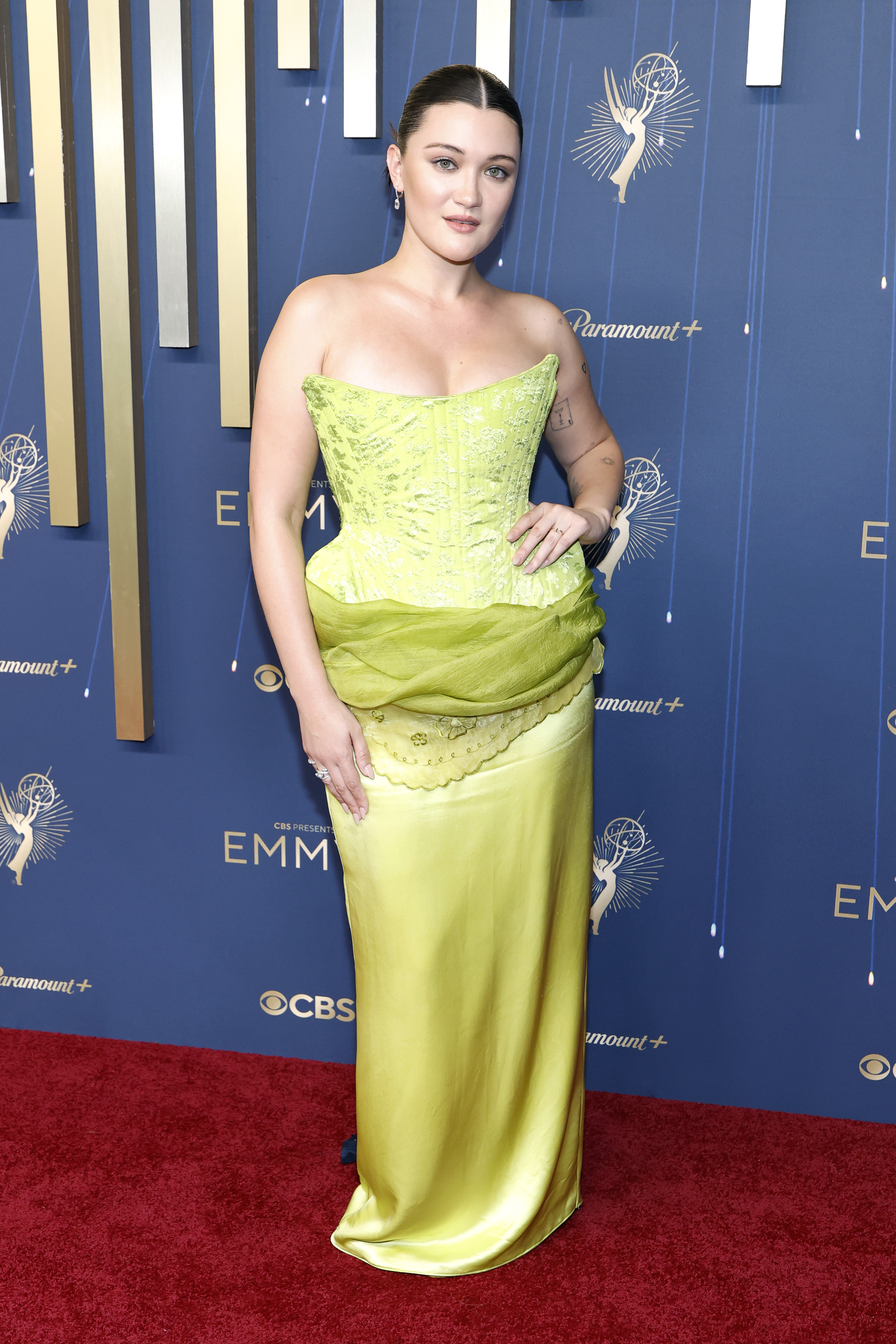 Isa Briones in a chartreuse gown on the red carpet.