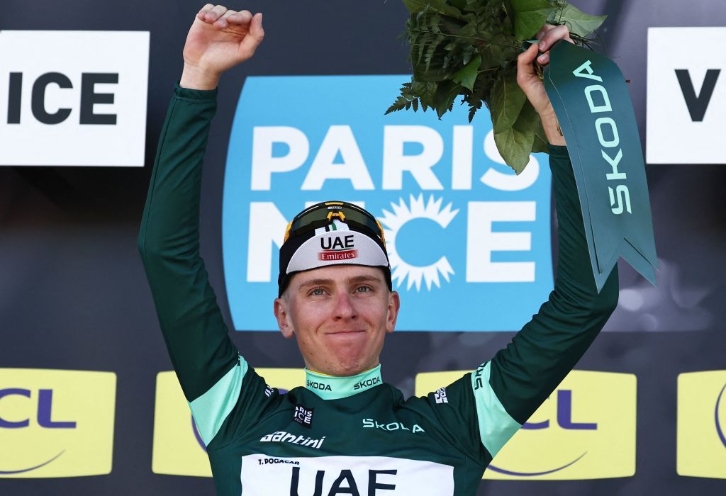 Overall winner UAE Team Emirates Slovenian rider Tadej Pogacar wearing the sprinters green jersey celebrates on the podium after winning the 8th and final stage of the 81st Paris Nice cycling race 1175 km between Nice and Nice in French riviera city of Nice southeastern France on March 12 2023 Slovenias Tadej Pogacar wins ParisNice title after winning the final stage on March 12 2023 Photo by AnneChristine POUJOULAT AFP Photo by ANNECHRISTINE POUJOULATAFP via Getty Images