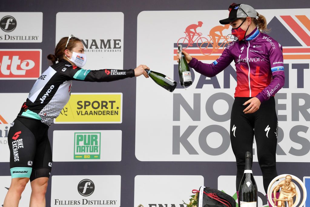 NOKERE BELGIUM MARCH 17 Podium Grace Brown of Australia and Team BikeExchange Amy Pieters of Netherlands and Team SD Worx Celebration during the 3rd Nokere Koerse Danilith Classic 2021 Womens Elite a 124km race from Deinze to Nokere Mask Covid safety measures Champagne NokereKoerse on March 17 2021 in Nokere Belgium Photo by Mark Van HeckeGetty Images