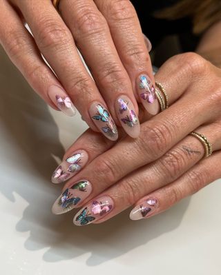 Holographic butterfly nail art