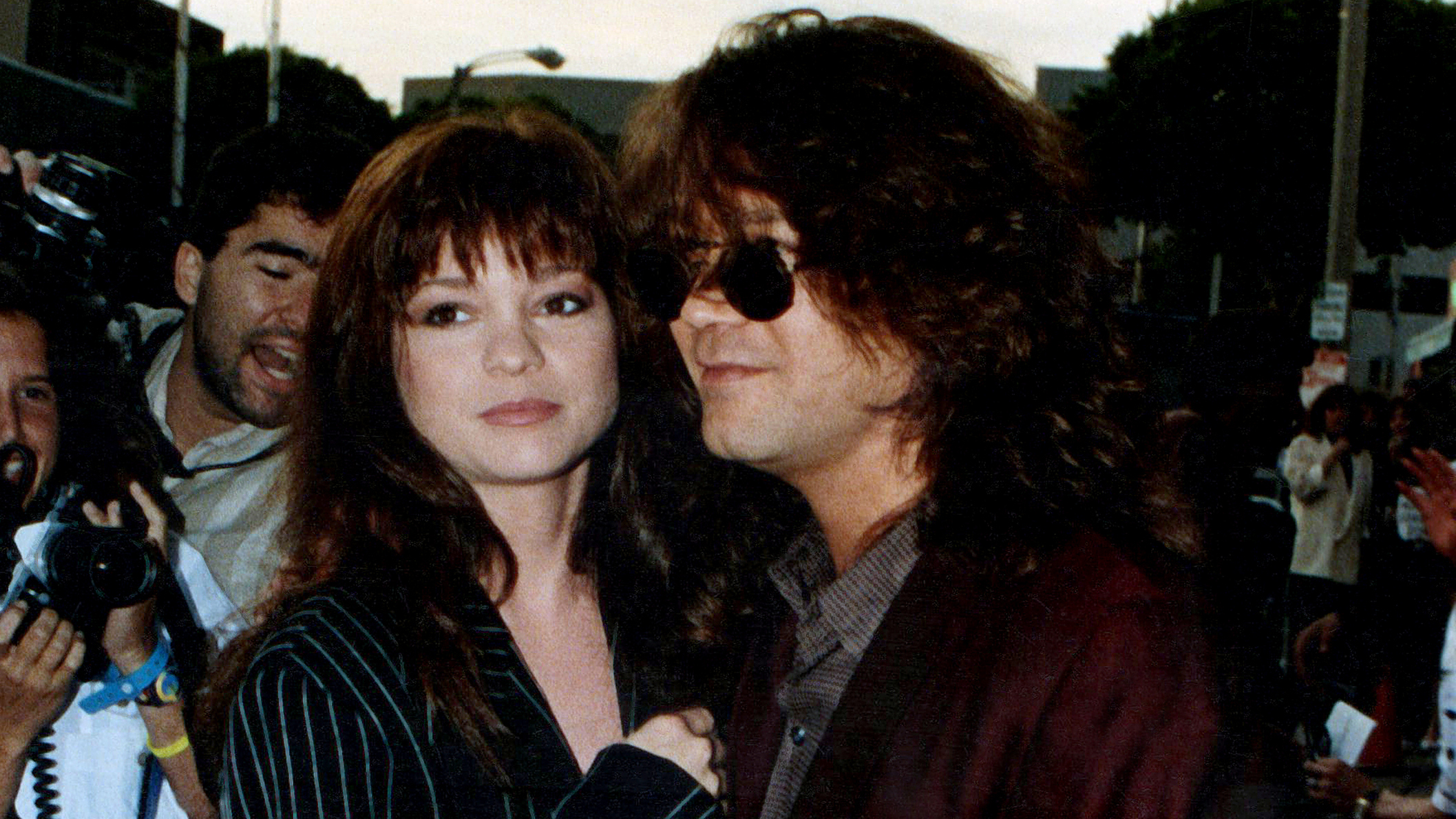 Eddie Van Halen and Valerie Bertinelli attend the Batman movie premiere on June 19, 1989 in Westwood section of Los Angeles, California.  