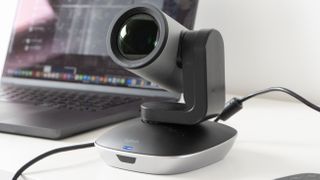 Logitech PTZ Pro 2 camera in front of a laptop