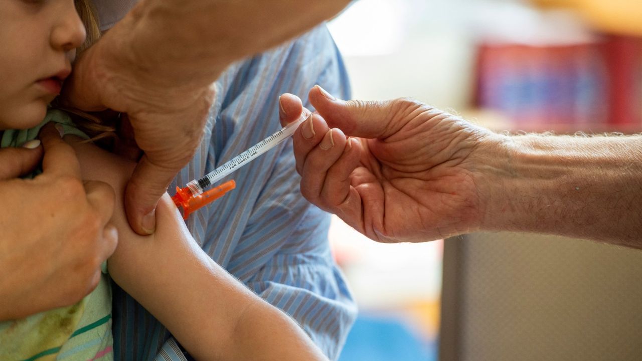 A child gets a Covid-19 vaccine in Needham, Massachusetts, on June 21, 2022.