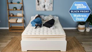 Two Tom's Guide Sleep Writers lying next to each other on their side on the Saatva Classic mattress