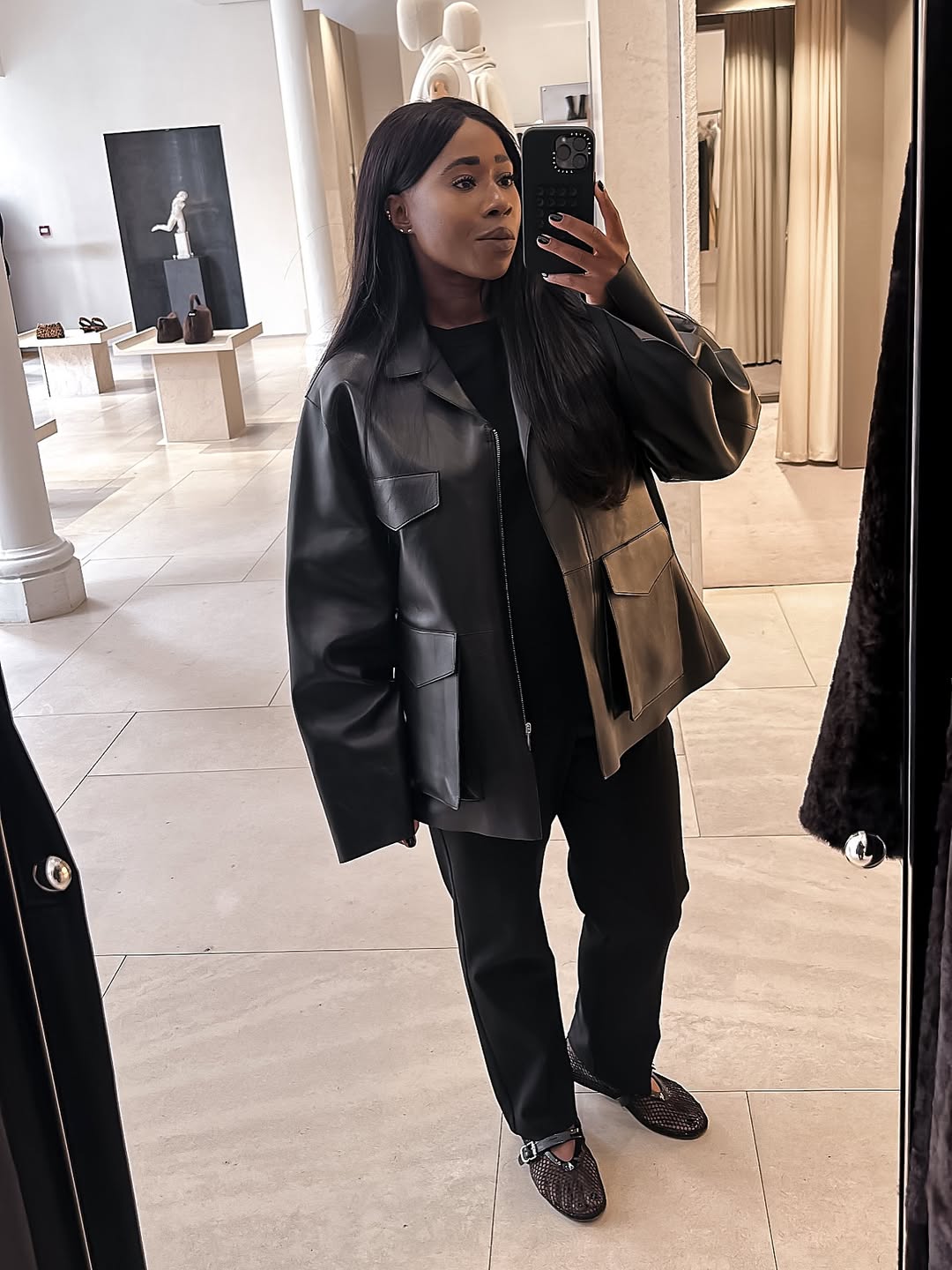 Lois wearing black outfit