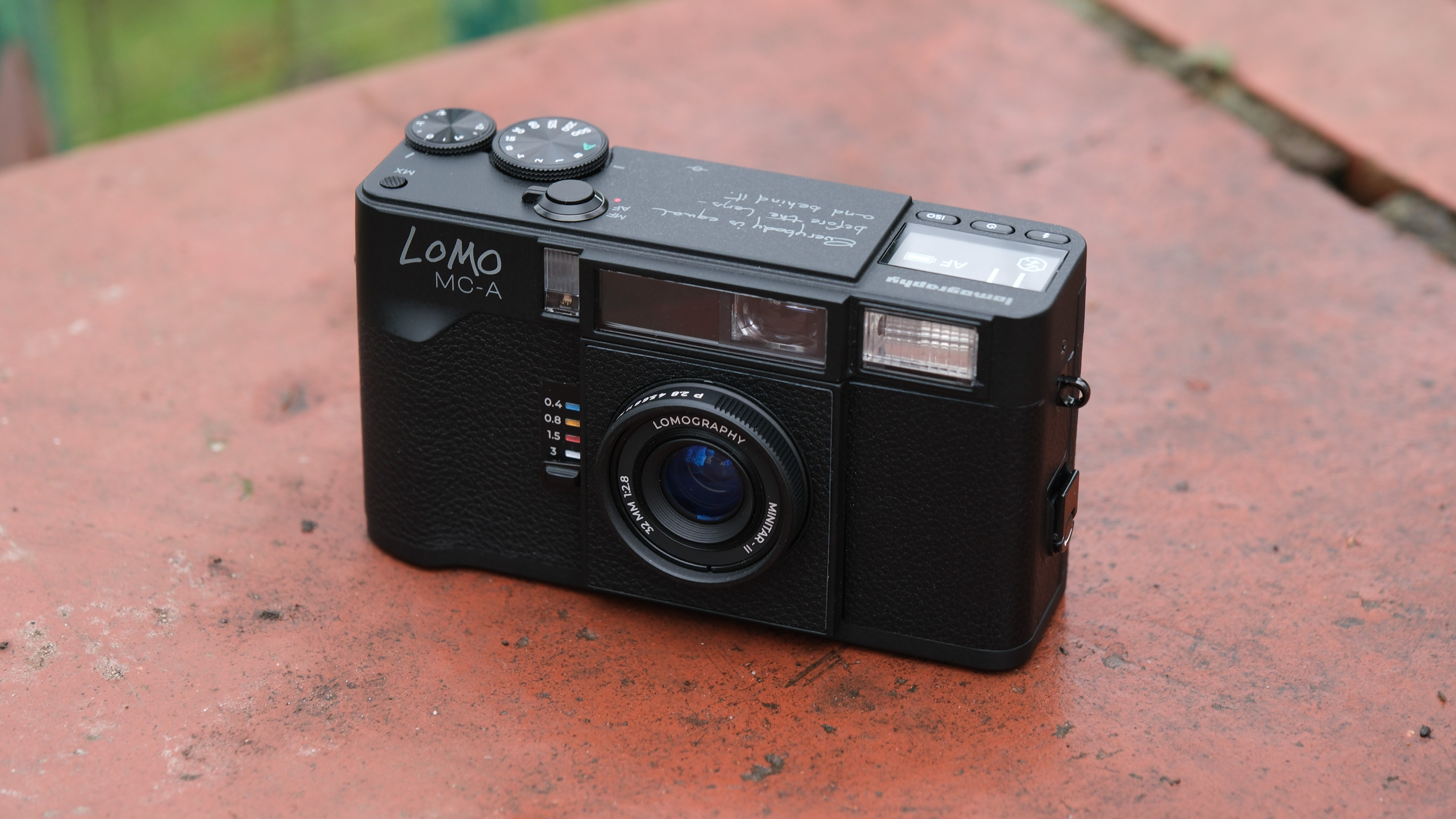 Lomography Lomo MC-A camera on a brick wall