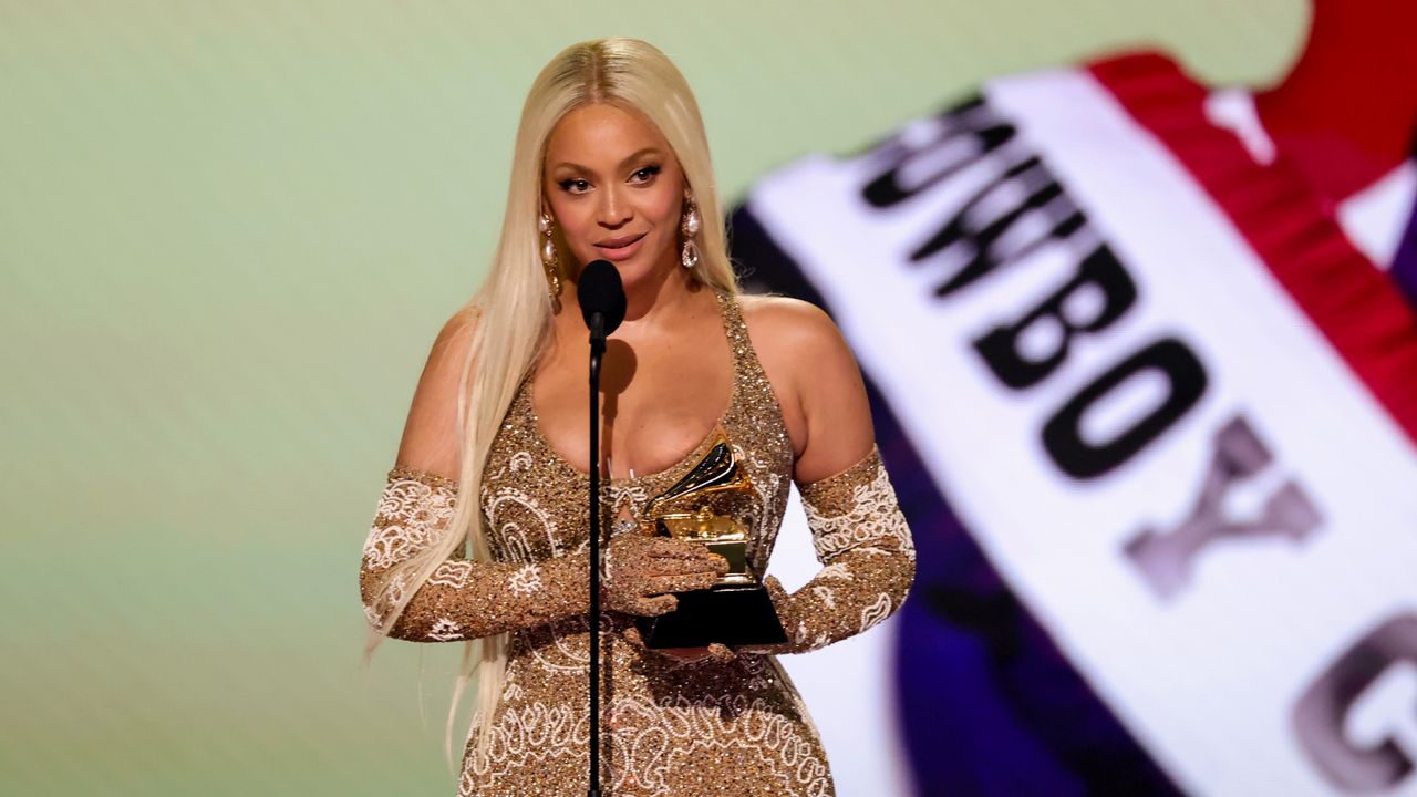 Beyoncé accepts the award for Best Country Album at the 2025 Grammys.