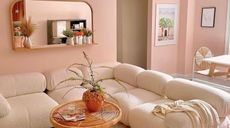 Light pink living room with white couch