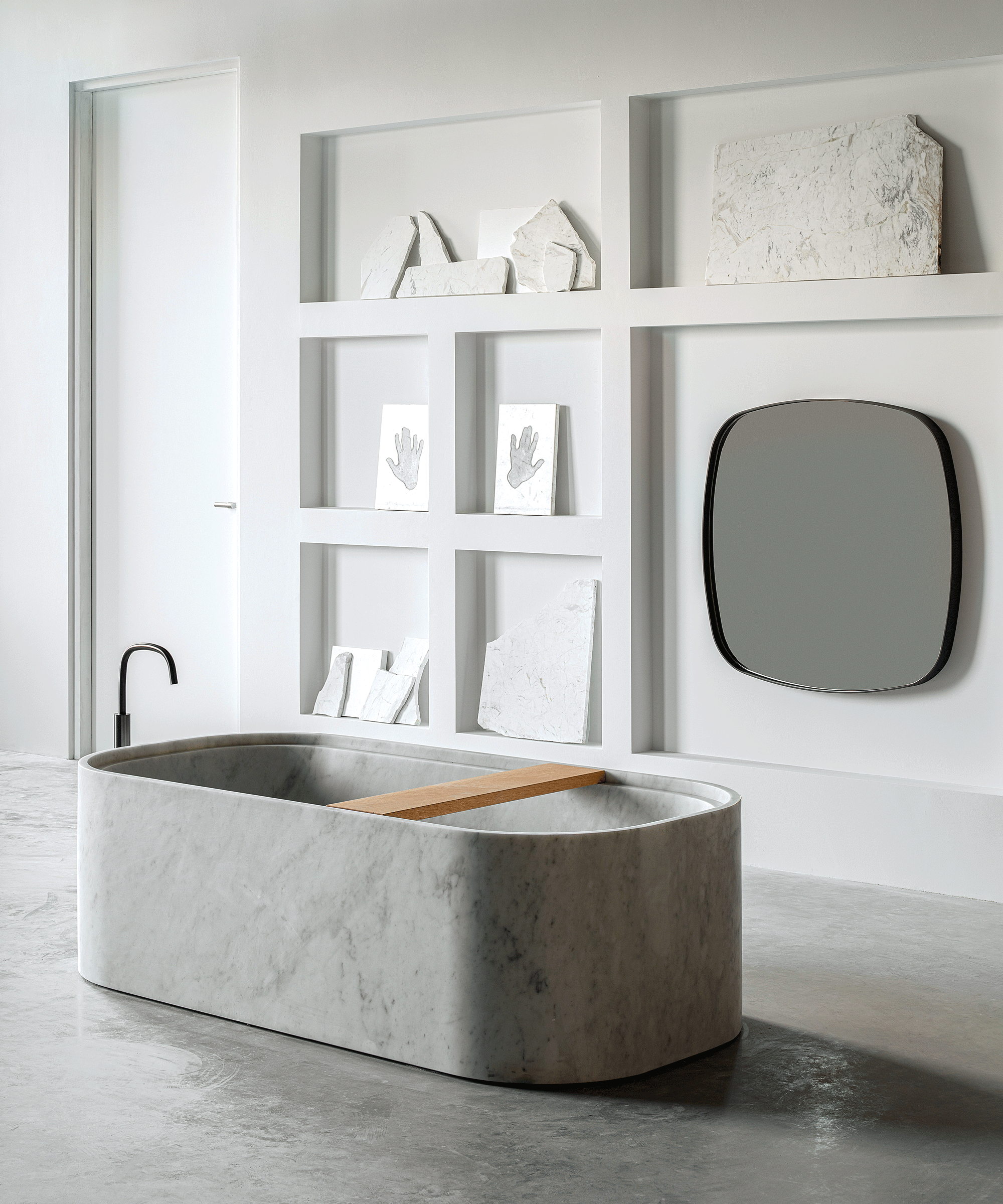 freestanding white marble bath in minimalist bathroom design